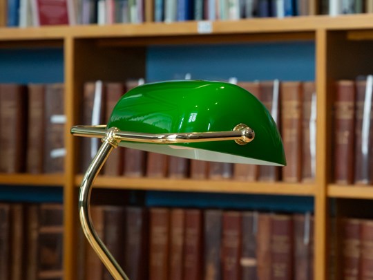 Library desk lamp with brown books - Promo